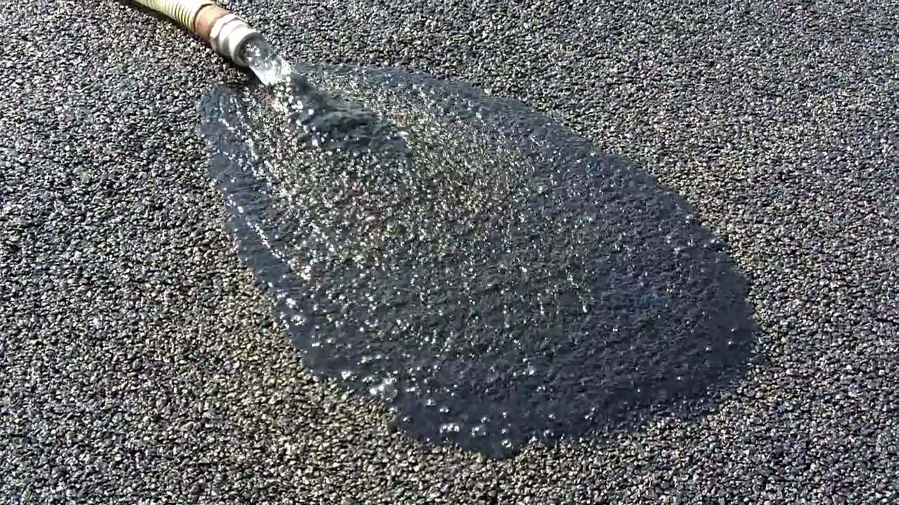 green commercial paving staunton Running hose on asphalt pavement